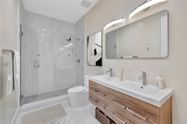 909 NE 16th Ter Unit 2, Fort Lauderdale, FL 33304 - full bathroom featuring a marble finish shower, toilet, double vanity, and marble finish flooring