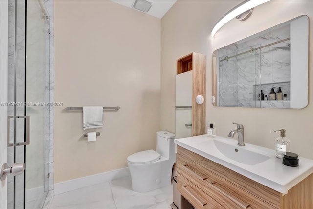 bathroom featuring vanity, a shower with shower door, and toilet