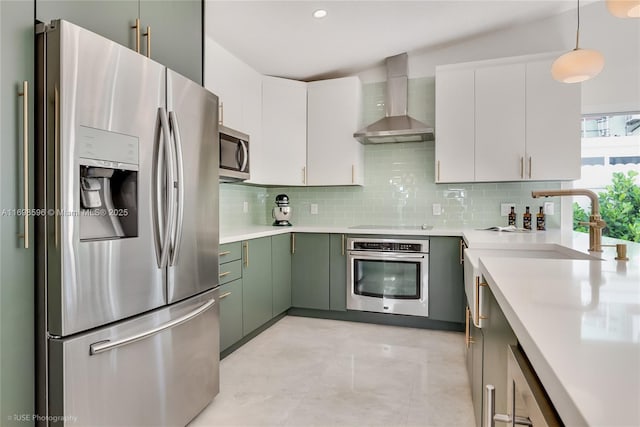 14584 SW 115th St, Miami, FL 33186 - kitchen with appliances with stainless steel finishes, wall chimney range hood, tasteful backsplash, and light countertops