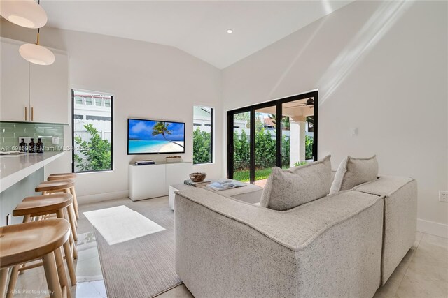 14584 SW 115th St, Miami, FL 33186 - living area with plenty of natural light, high vaulted ceiling, and a dry bar