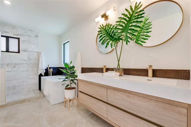 14584 SW 115th St, Miami, FL 33186 - full bathroom with marble look tile flooring, a marble finish shower, a freestanding bath, double vanity, and recessed lighting