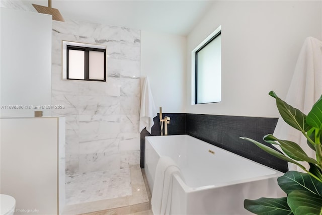 14584 SW 115th St, Miami, FL 33186 - full bath with a freestanding tub, a marble finish shower, tile walls, and a wainscoted wall