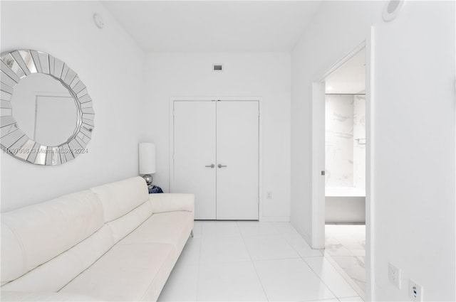 living room featuring light tile patterned floors