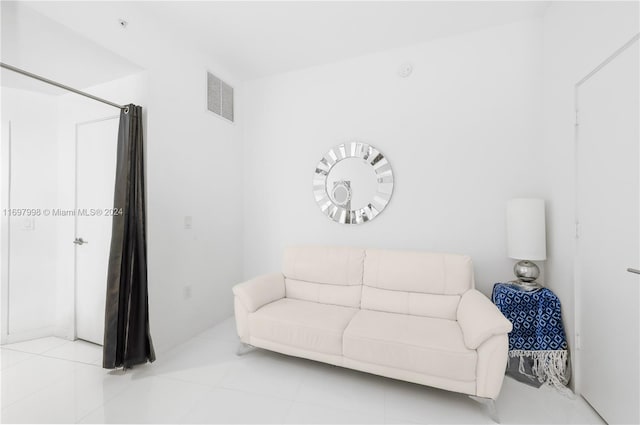 living room featuring light tile patterned floors