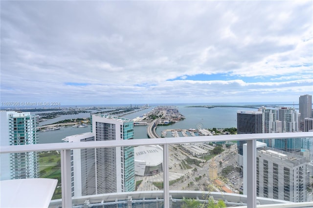 balcony featuring a water view