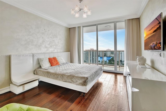 bedroom featuring floor to ceiling windows, access to outside, crown molding, hardwood / wood-style flooring, and a notable chandelier