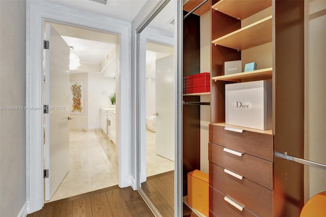 3201 NE 183rd St Unit 2607, Aventura, FL 33160 - walk in closet with wood finished floors