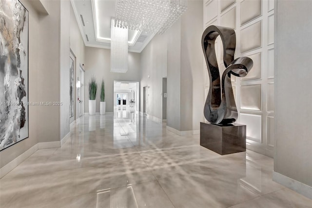 3201 NE 183rd St Unit 2607, Aventura, FL 33160 - hallway featuring a high ceiling and baseboards