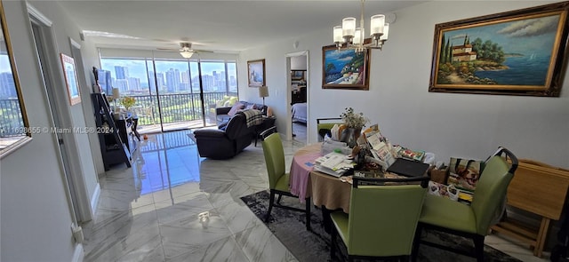 dining room with ceiling fan with notable chandelier