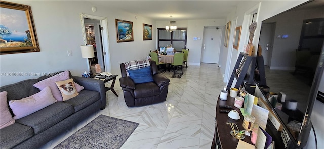 living room featuring a chandelier