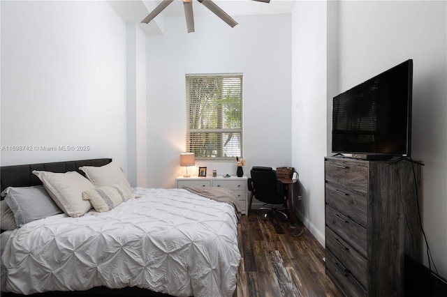 bedroom with ceiling fan and dark hardwood / wood-style flooring