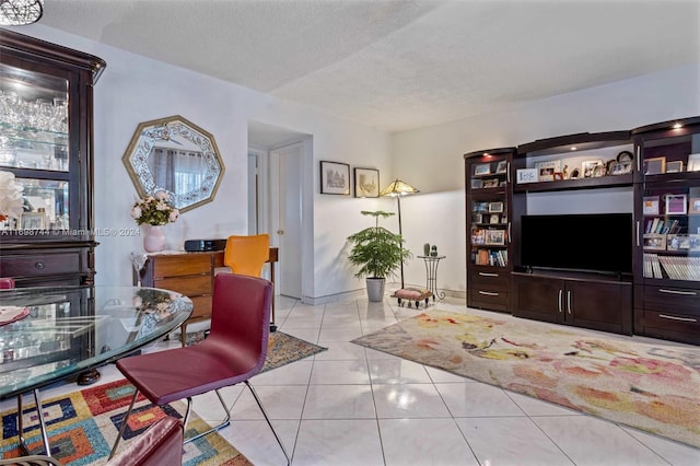 tiled living room with a textured ceiling