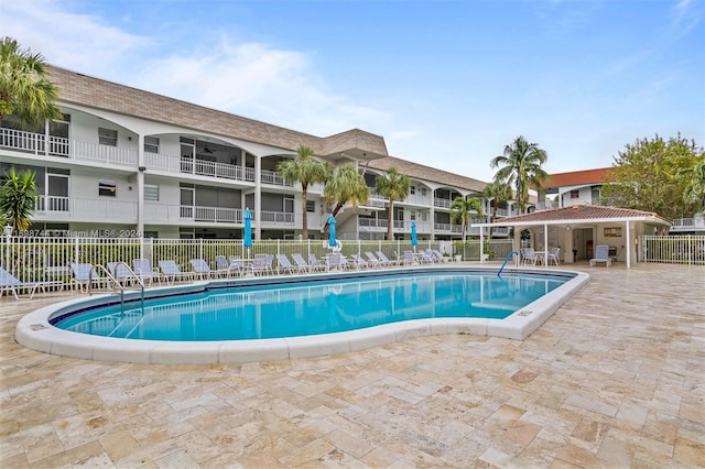 view of pool featuring a patio area