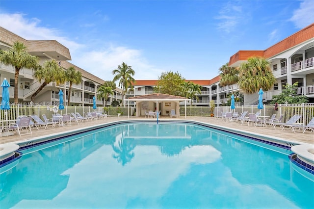 view of swimming pool with a patio