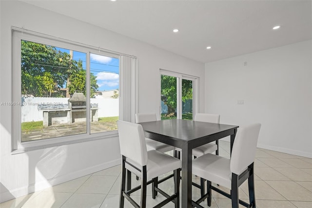 view of tiled dining space