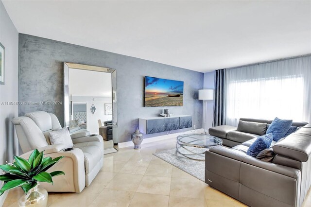 living room with light tile patterned floors