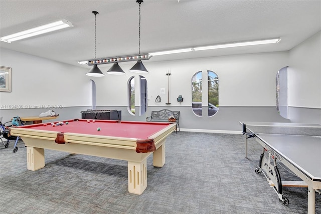 rec room with a textured ceiling, carpet floors, and billiards