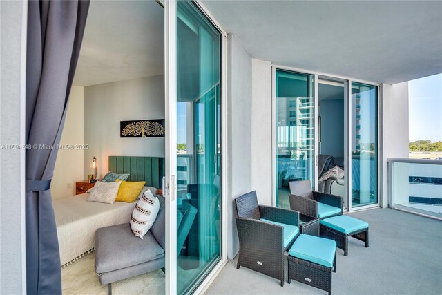 living room with a textured ceiling and light carpet