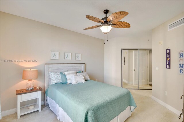 carpeted bedroom with ceiling fan