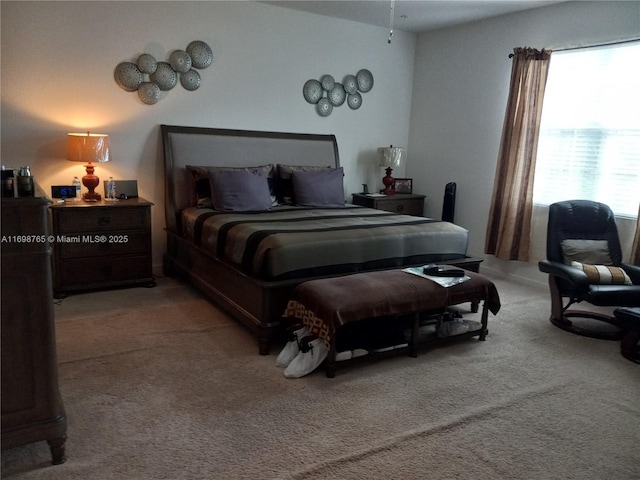 bedroom featuring carpet