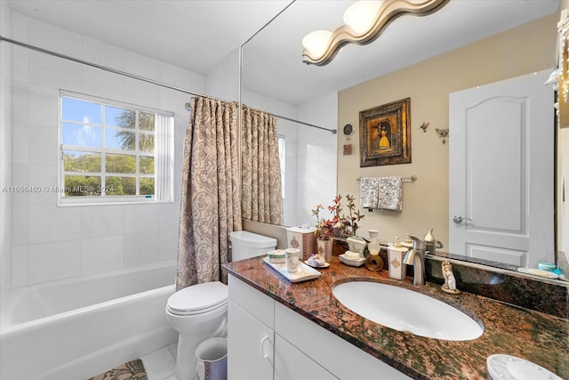 full bathroom featuring tile patterned floors, shower / bath combo, toilet, and vanity