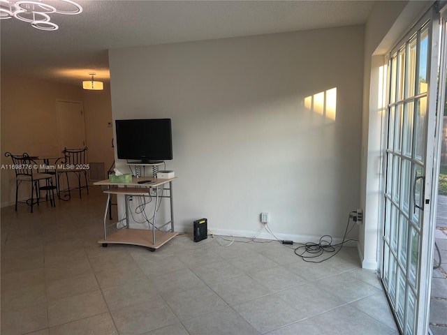 living room featuring a textured ceiling