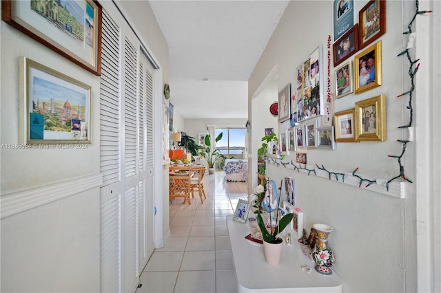 hallway with light tile patterned floors