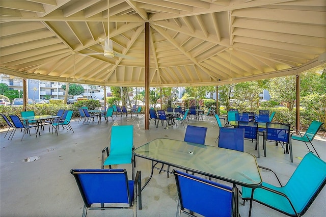 view of patio / terrace with outdoor dining space and a gazebo