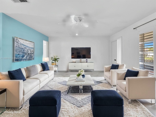 living room featuring ceiling fan