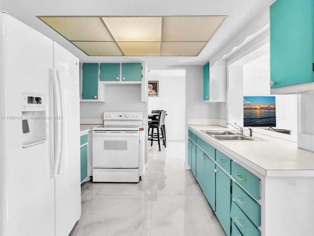 kitchen featuring white appliances and sink