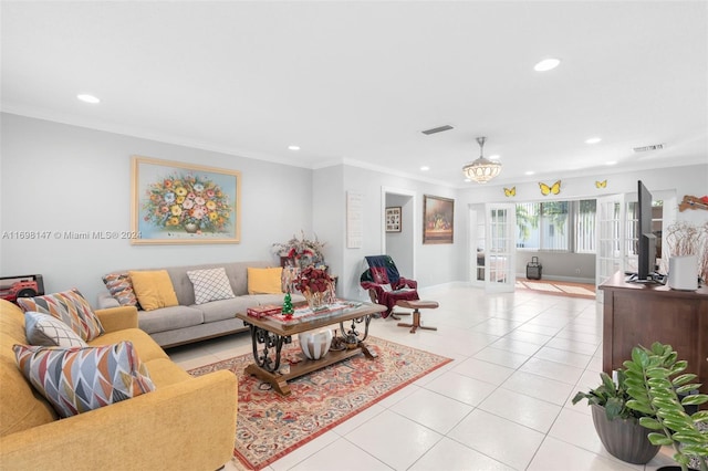 tiled living room with ornamental molding and french doors