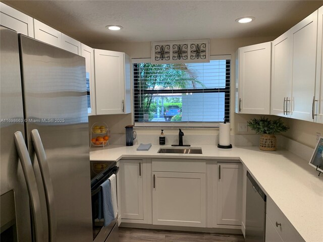 kitchen featuring white cabinets