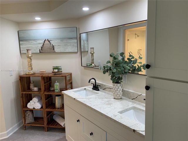 bathroom with vanity and tile patterned floors