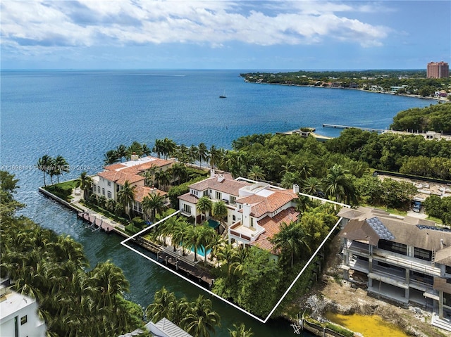 birds eye view of property featuring a water view