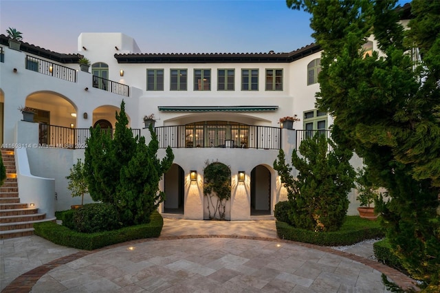 3305 S Moorings Way, Miami, FL 33133 - mediterranean / spanish home featuring stucco siding, stairs, and a balcony