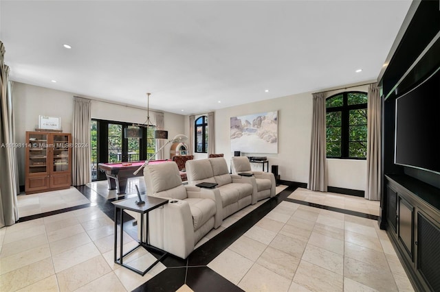 living room with pool table and french doors