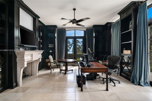 home office featuring french doors and ceiling fan