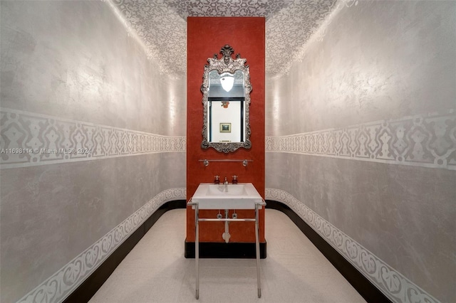 3305 S Moorings Way, Miami, FL 33133 - bathroom featuring vanity and wainscoting