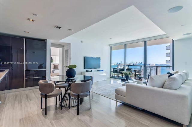 living room with floor to ceiling windows