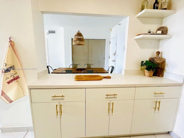 bathroom with vanity and tile patterned floors