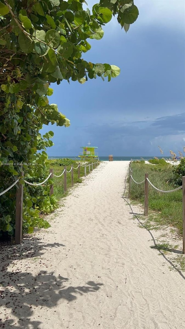 property view of water featuring a view of the beach