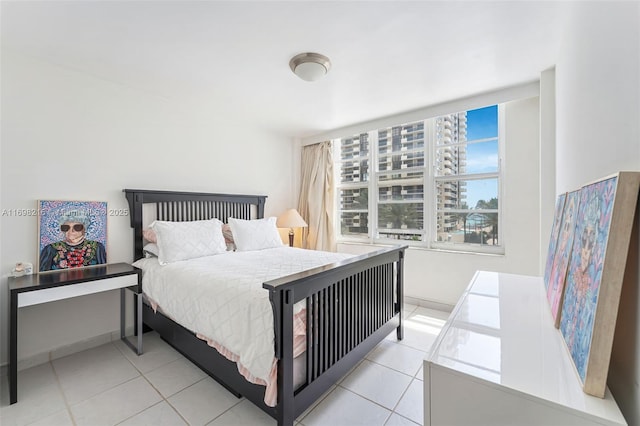 5700 Collins Ave Unit 5B, Miami Beach, FL 33140 - bedroom featuring tile patterned flooring