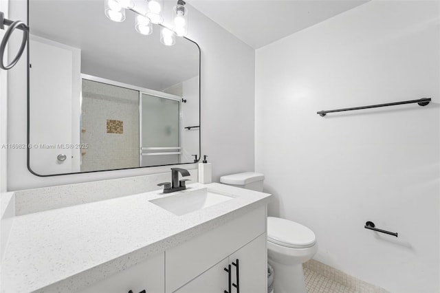5700 Collins Ave Unit 5B, Miami Beach, FL 33140 - full bathroom featuring vanity, a stall shower, and tile patterned floors