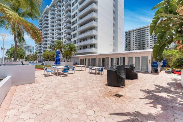 5700 Collins Ave Unit 5B, Miami Beach, FL 33140 - view of patio / terrace featuring grilling area