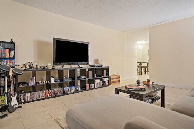 tiled living room with a textured ceiling