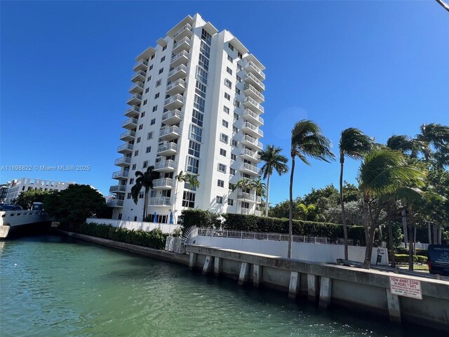 view of property with a water view