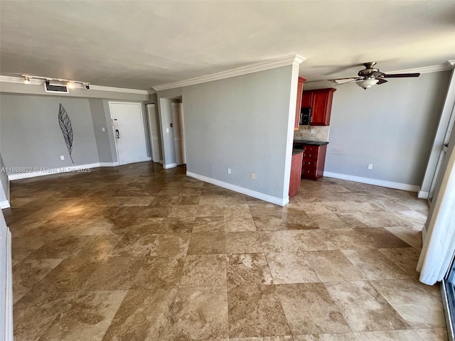 unfurnished living room with crown molding, ceiling fan, and baseboards