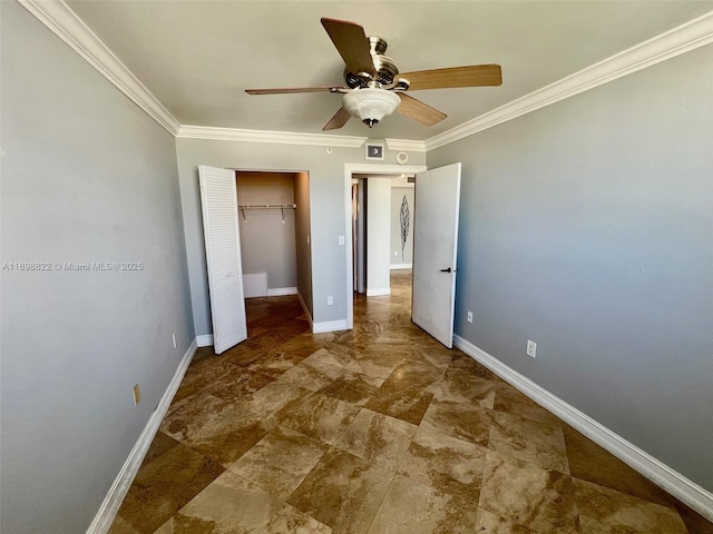 unfurnished bedroom featuring a ceiling fan, a closet, crown molding, and baseboards