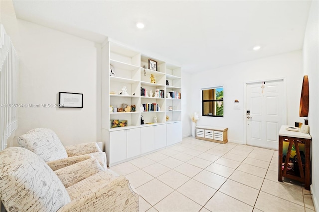 sitting room with light tile patterned floors