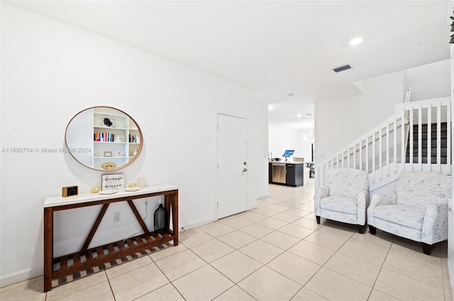 interior space featuring light tile patterned floors